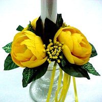 1 Ranunculus candle ring with ribbon bow.